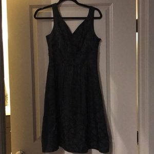 Black cocktail dress with faint pattern